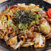 Yakiudon · Pan-fried udon noodles bacon and vegetable with yakisoba sauce.