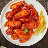 Buffy The Buffalo Chicken Wings · Fresh chicken wings breaded, fried until golden brown, and tossed in buffalo sauce. Served w...