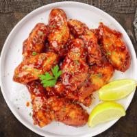 Grilled Honey Sizzle Wings · Fresh chicken wings breaded, fried until golden brown, and tossed in honey and barbecue sauc...