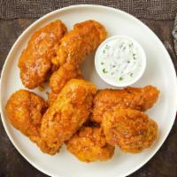 Go Go Mango Habanero Wings · Fresh chicken wings breaded, fried until golden brown, and tossed in mango habanero sauce. S...