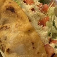 Bistec Quesadillas · Steak. Served with lettuce, tomato, cheese and sour cream.