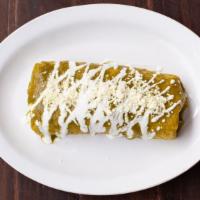 Burrito Mojado · Sauteed peppers, onions, guacamole, crema, jack cheese, rice and beans topped with choice of...