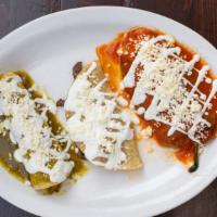 Enchiladas Verde O Rojas · Three soft corn tortillas with choice of stuffing in green sauce or red sauce topped with cr...