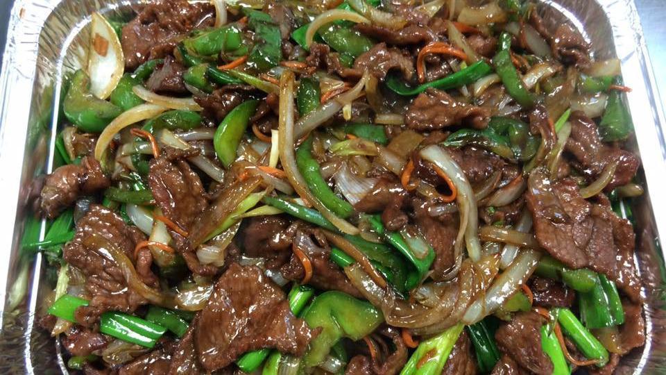 Hot And Spicy Beef · With white rice. Hot and spicy.