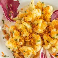 Cauliflower Oreganata · Tossed with garlic, oil, Italian seasonings, & breadcrumbs.