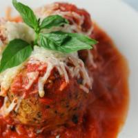 Garden Meatball Appetizer · Three of our homemade, delicious garden meatless meatballs topped with marinara sauce & Daiy...