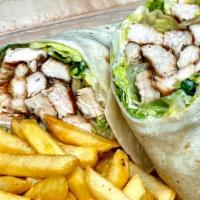 Grilled Chicken Caesar Wrap · Grilled chicken with romaine lettuce and caesar dressing on a wrap. Served with french fries.