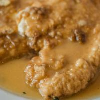 Chicken Francese · breast of chicken dipped in egg & our, sautéed in a white wine, lemon & butter sauce.