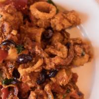 Calamari Arrabbiata · fried & tossed with marinara, black
gaeta olives, & cherry peppers.