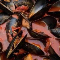 Mussels Marinara · Fresh Pei mussels served hot, sweet or spicy tomato sauce.