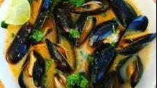 Thai Mussels · Red Thai curry mild spicy coconut cream sauce. Wild organic PEI mussels served with fries an...