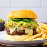 The Mexican Burger · Topped with Cheddar cheese, guacamole, pickled jalapeno. 8 oz grass fed beef blend served wi...