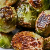 Sherry Brussels Sprouts · Slightly fried tossed with sherry vinaigrette, organic honey drizzle. Vegetarian. Gluten free.