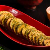 Kyoto Sweet Potatoes · Fried slices of Japanese Sweet Potato, Japanese seven spice, served with a side of Spicy Mayo