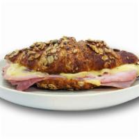 Ham & Swiss Croissant · Multigrain seeded croissant, with country ham, swiss cheese, and dijonaise