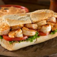 Fried Shrimp Po Boy · Plump, golden fried shrimp, served with fresh lettuce, tomato and mayo on a soft roll. Comes...