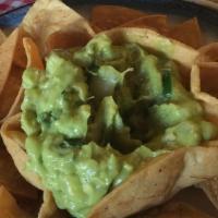Fresh Guacamole & Chips · A creamy dip made from avocado.