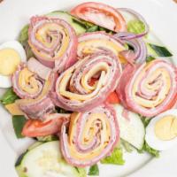 Chef Salad · Julienne turkey, ham, roast beef, Swiss cheese, hardboiled egg over mixed greens.