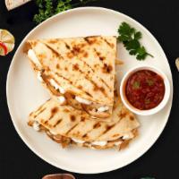 Chicken Quesadilla · Grilled chicken wrapped with cheese in a grilled tortilla.