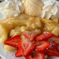 Apple Cobbler Crêpe · Like Apple Pie?  You’ll love this!  Comes stuffed with apple filling, cinnamon-apple pieces,...