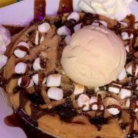 S'Mores Waffle · A campfire-inspired waffle covered in chocolate chips, graham cracker crumbs, mini marshmall...
