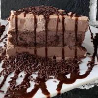 Chocolate Madness Ice Cream Cake · Ditch the crepe and try this twist on our Chocolate Cake Obsession.  A slice of chocolate ca...