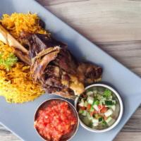 Lamb Over Rice · Rich rice platter served with fresh lamb, lettuce, and tomatoes. Comes with white and hot sa...