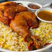 Chicken Over Rice · Rice platter served with fresh chicken, lettuce, and tomatoes. Comes with white and hot sauc...