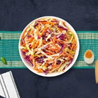 Coleslaw Slayer · Shredded cabbage and carrots dressed in mayonnaise and apple cider vinegar.
