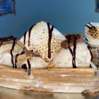 Smores · Two scoops with toasted jumbo marshmallow crackers & chocolate.