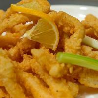 Fried Calamari  · Crispy fried on the outside, soft on the inside, pair with marinara sauce is a desired favor...