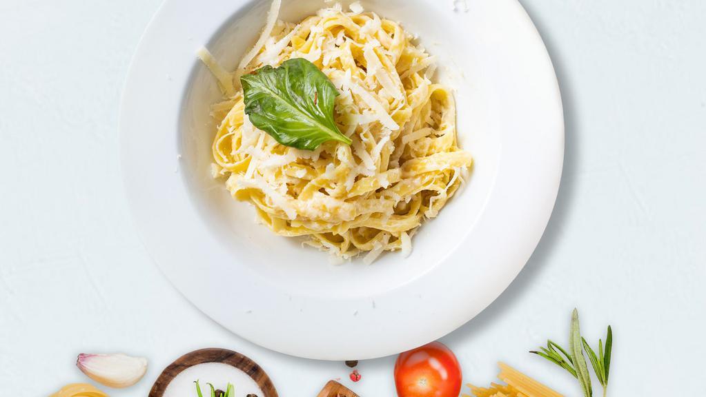 Uncle Alfredo'S Pasta (Fettuccine) · Fettuccine pasta cooked in creamy white sauce and aged parmesan. Served with bread.