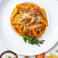 Primetime Primavera Pasta (Ziti) · Sautéed seasonal vegetables and tomatoes in a light tomato sauce in a bed of ziti pasta. Ser...