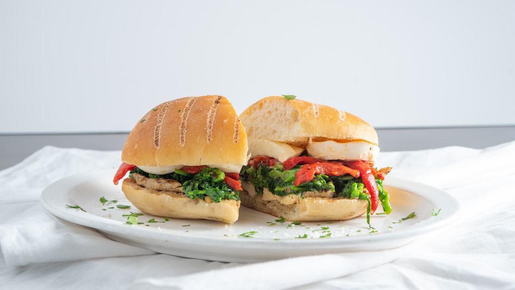 Broccoli Rabe Panini · Grilled chicken, sautéed broccoli rabe, fresh mozzarella and roasted peppers.