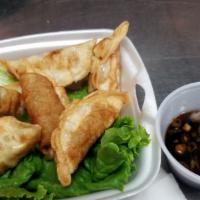 Spinach Dumpling (4 Pieces) · Vegetarian. With special soy sauce.