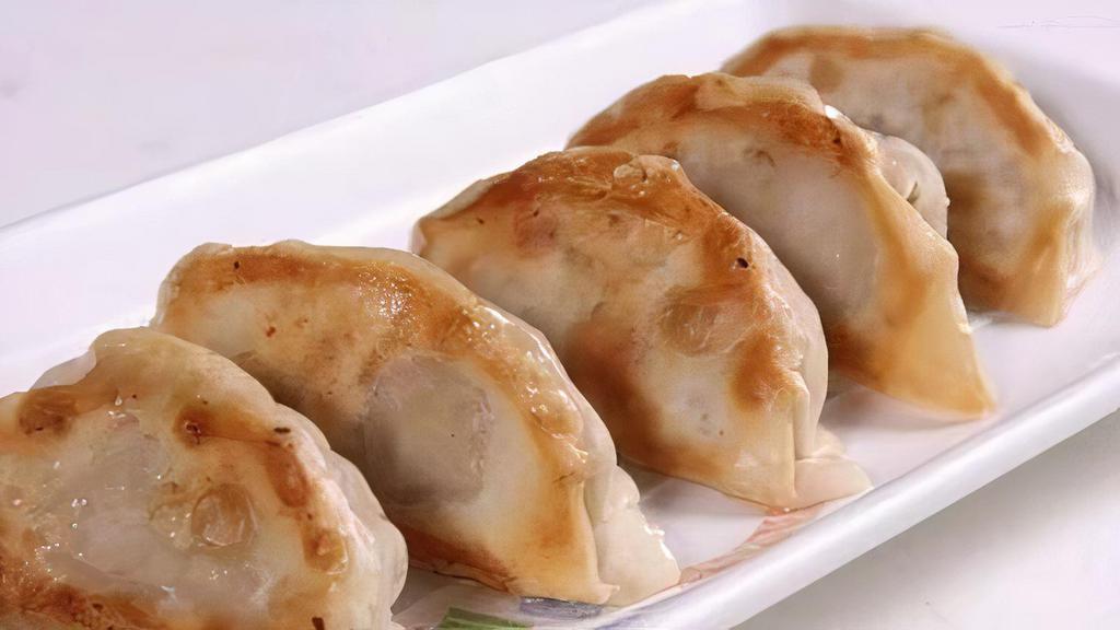 Vegetable & Mushroom Potsticker (4 Pieces)菜锅贴 · Hand crafted and steamed.
