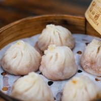 Crab Roe And Pork  Soup Dumplings (6 Pieces)蟹粉小笼包 · Hand crafted and steamed.