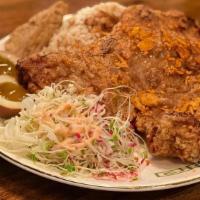 Monster Pork Chop · Giant size of deep fried pork chop packed with secret seasonings. Rice plates come with whit...