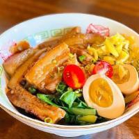 Fooki Belly Bowl · Rice bowl topped with braised thick cut pork belly, pickled mustard, plum tomato, a sweethea...