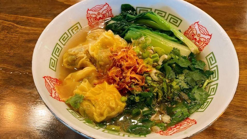 Wonton Noodle Soup - Original · Fresh noodle with delicate original beef broth, topped with house-made shrimp and pork wonton with water chestnut and veggies. (Garnish: Cilantro, green onion, Chinese celery, parsley, and fried shallot)