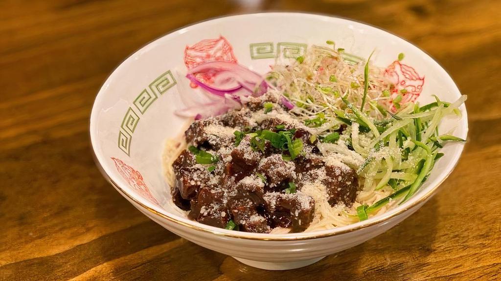 Jajiang Noodles · House-made Jajang sauce with pork, deep fried tofu, topped with red onion, cucumber and Parmesan cheese (No Soup)