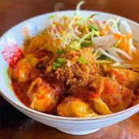 Mala Wonton Noodles · (Spicy) Fresh noodle top with house-made shrimp and pork wonton, peanut, fried shallot, frie...