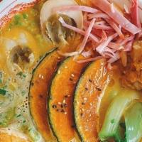 Fall In Love · Fresh noodles served with Chef-special Kabocha Pumpkin broth, topped with Shrimp patty, shre...