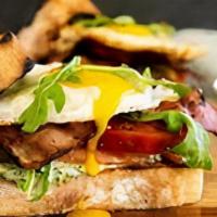Fried Egg Blt Sandwich · Bacon, lettuce, tomato, and two fried eggs on choice of bread.