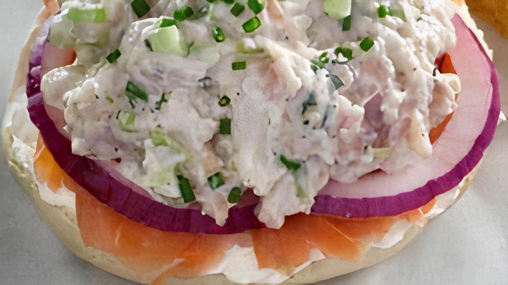 Brooklyn'S Own · A  Brooklyn favorite. Nova lox, Smoked Whitefish Salad, sliced cucumbers, tomatoes , onion. Served on Bagel or Bialy with a side of coleslaw and a Pickle