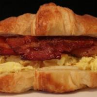 Croissant Breakfast Sandwich · Start with one of our freshly backed croissant, add two eggs any style , crispy bacon, pork ...