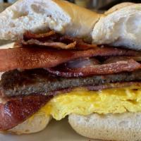 The Belly Buster · For the meat lovers. You do not have to choose. Get it all, eggs, bacon, sausage,  pork roll...