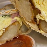 Super Burrito · Scrambled eggs,Bacon, Pork Roll, Suasage, sauteed onions, peppers, melted Cheddar and home f...