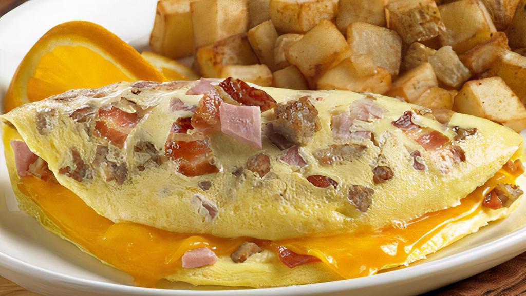 Meat Lover Omelette · Have it all. three eggs with Ham, Bacon, Sausage Pork Roll