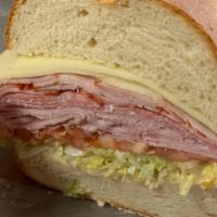 New York Ski High · Premium Pastrami, Oven Gold turkey, Cole-slow, Russian dressing, Deli Pickles on your choice...
